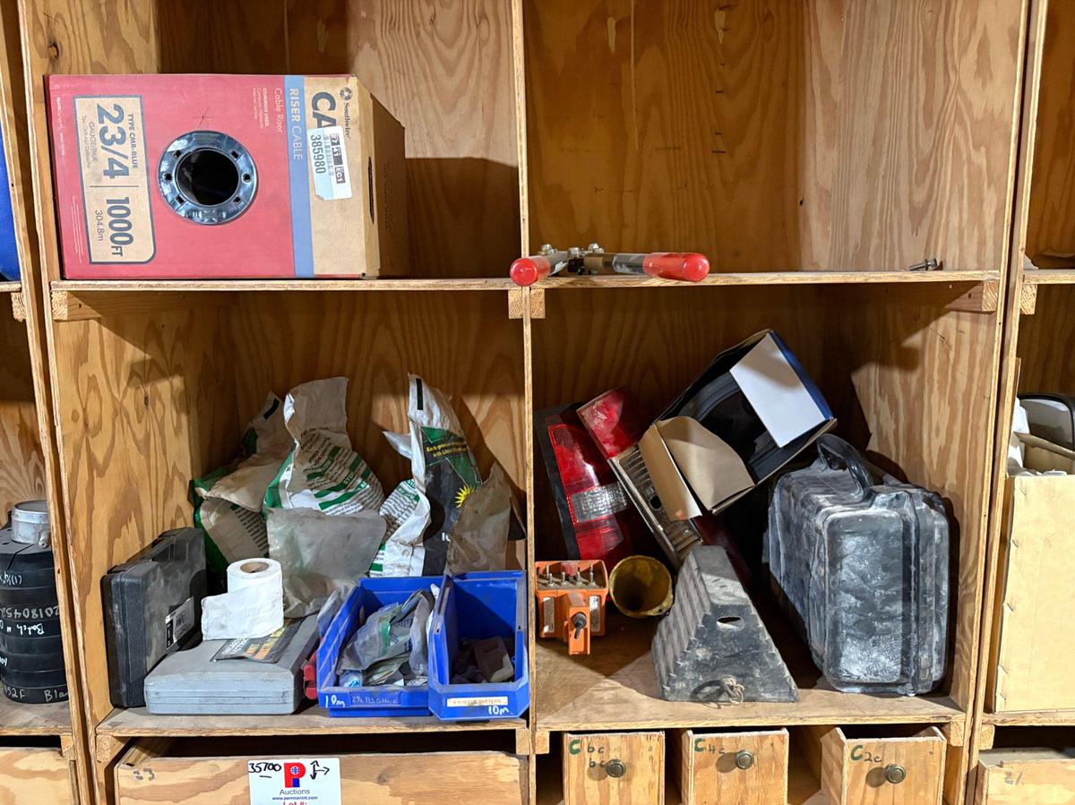 Used (4) shelves w/ assorted truck parts, chains, hand tools, etc.