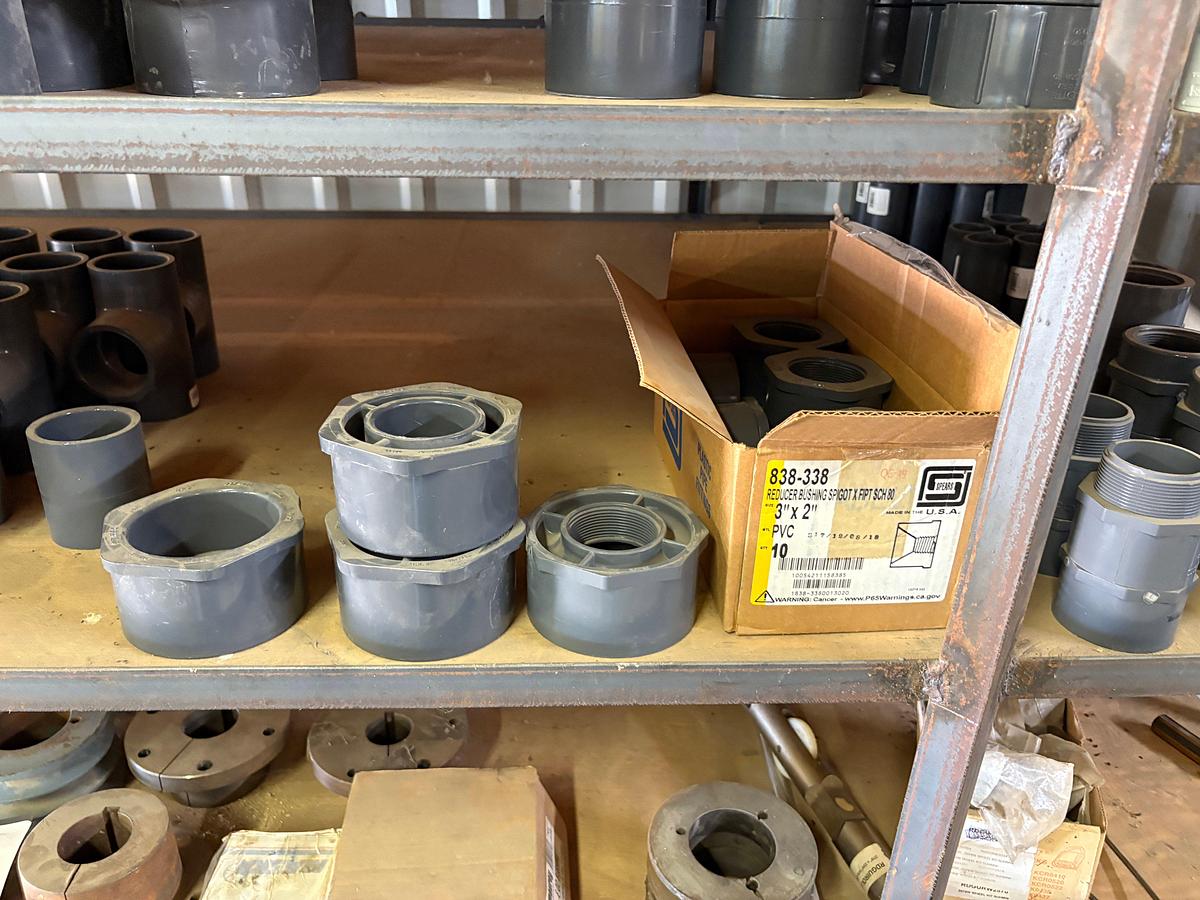 Used Contents of (5) shelves w/ U-line oil spill pads, various 2” to 4” PVC pipe fittings, etc.