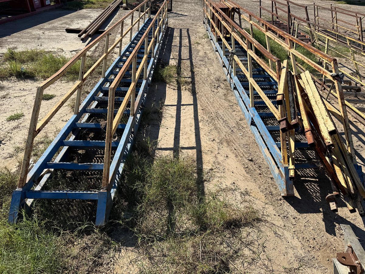 Used (2) 27’ STEEL RIG LADDERS