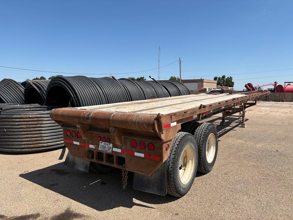 Used 1982 SHOPBUILT 40’ X 8’ T/A FLATBED TRAILER