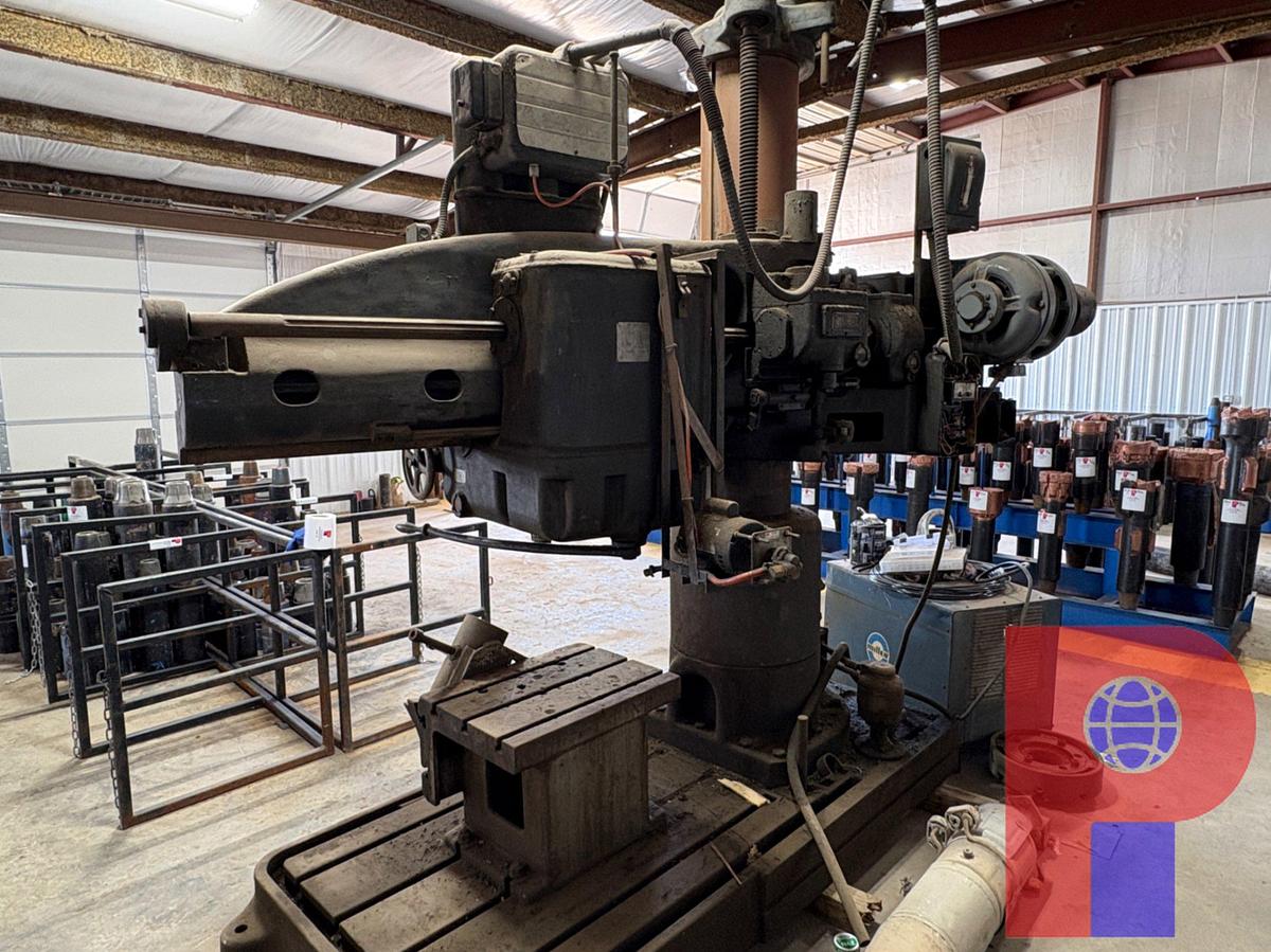 Used CARLTON 4’ ARM ON 13”COL RADIAL ARM DRILL