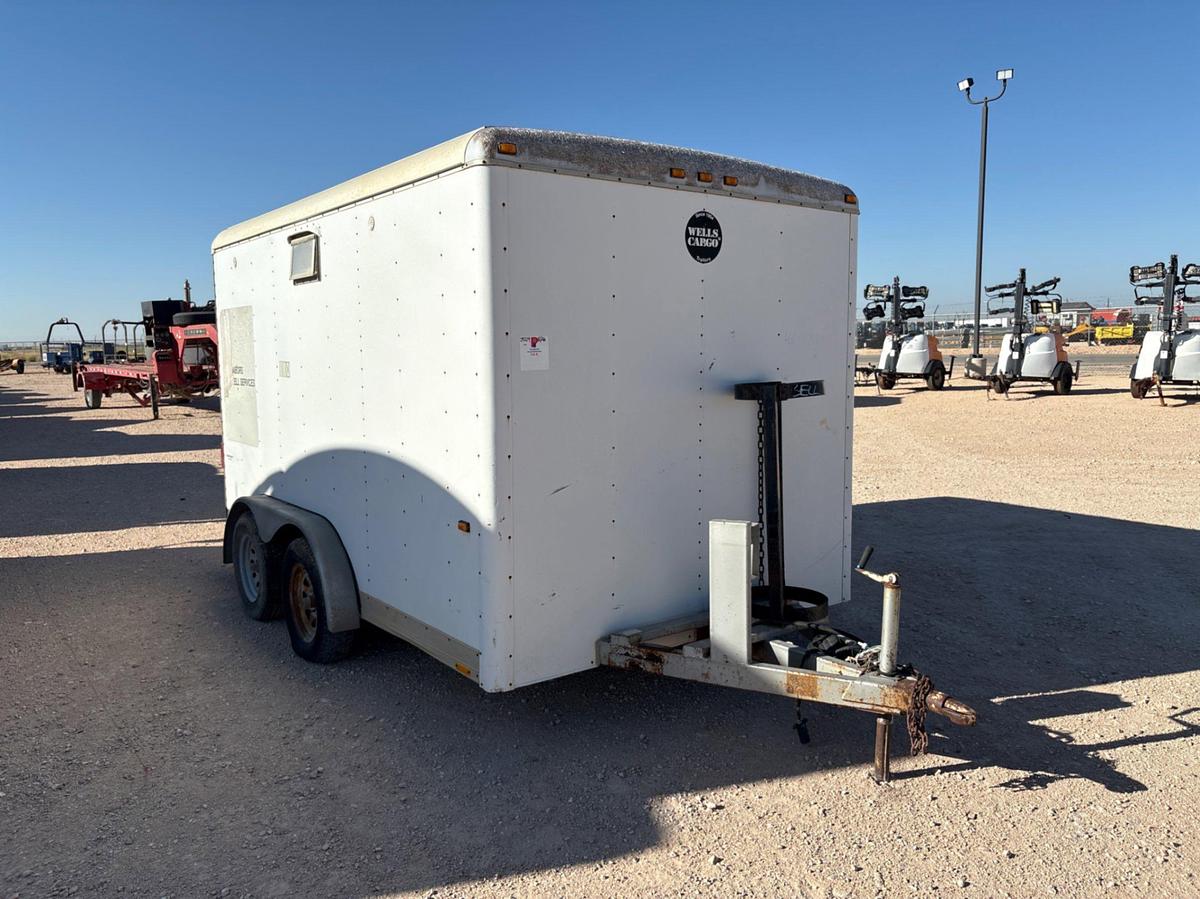 Used Wells Cargo 12’ X 7’ t/a bumper pull doghouse trailer