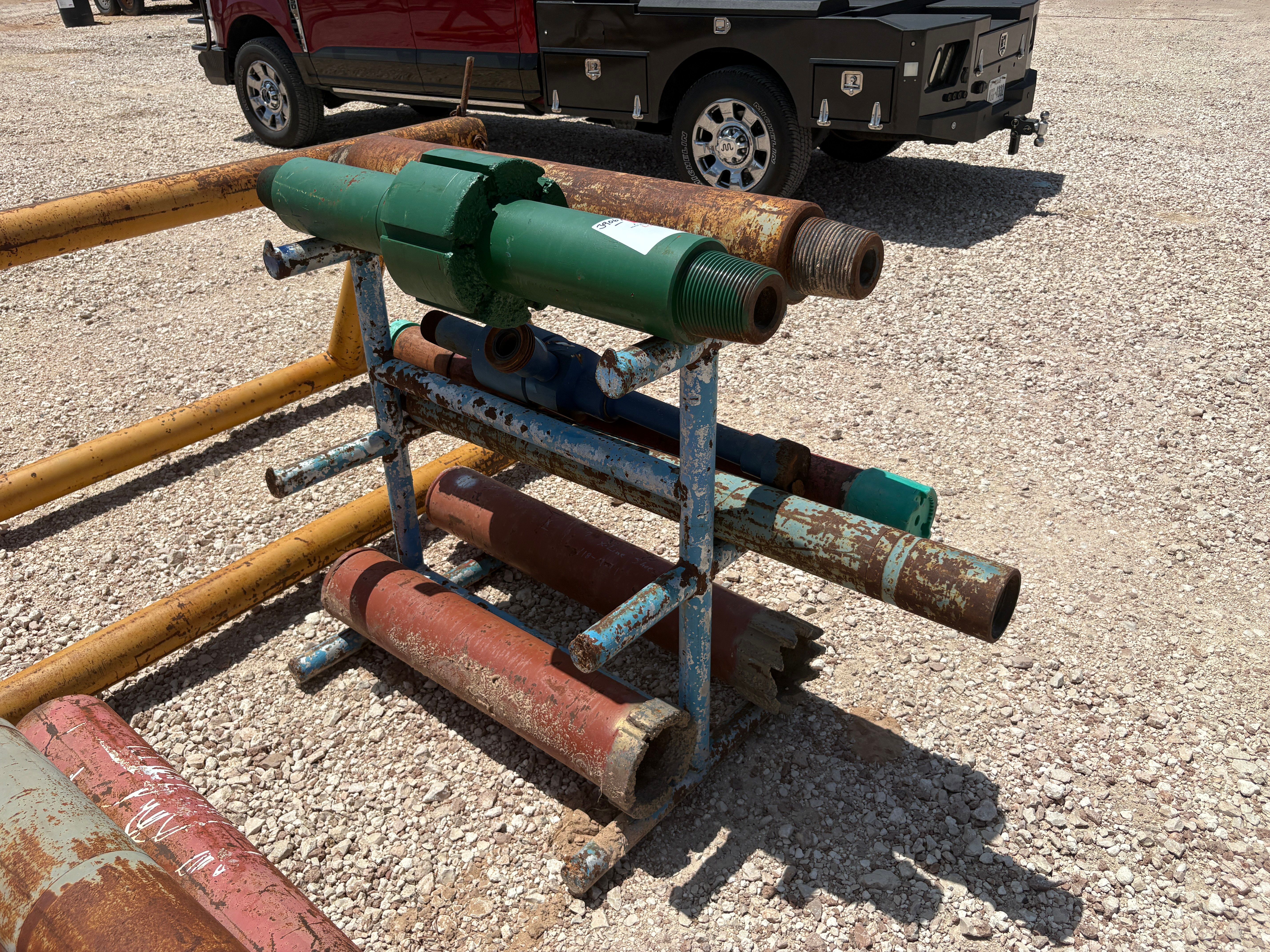 Used 3’ x 2.5’ x 40” tool rack w/ (2) wp shoes, (1) 11”OD pilot mill, assorted pup jts & x-overs