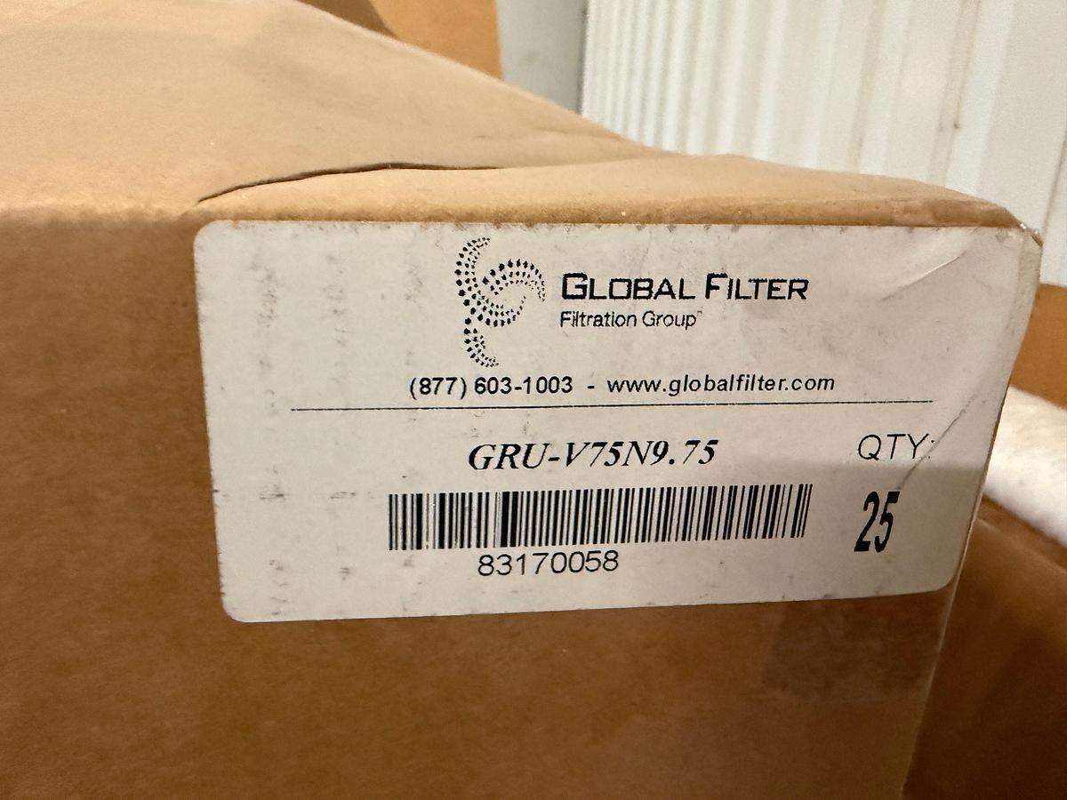Used Section of  MOSTLY Global Filter industrial filter cartridges (part number GRU-V75N9.75, quantity 100+), Box of Camlock Fittings