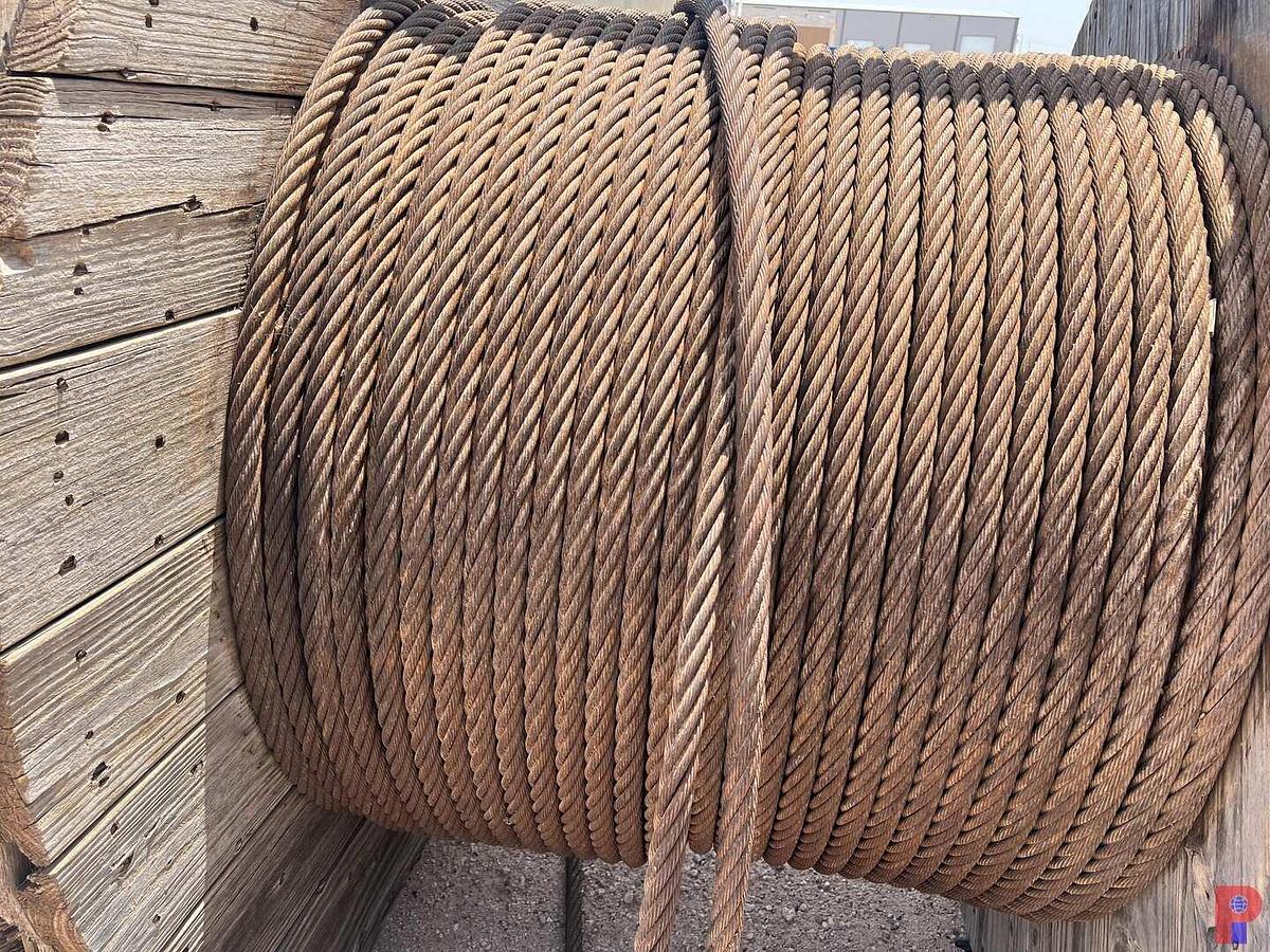 Used SPOOL STAND WITH 5’6” DIAMETER SPOOL 1/4 FULL OF 1” DRILL LINE