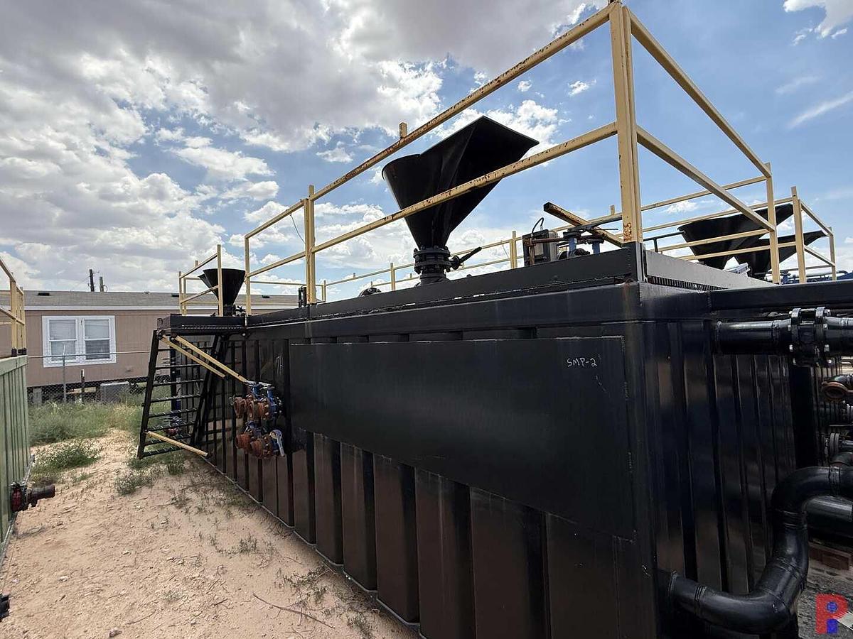 Used 27’L X 10’W X 6.5’H 2-COMPARTMENT 260 BBL. MIXING TANK P/B (4) 75 HP ELECTRIC MOTORS