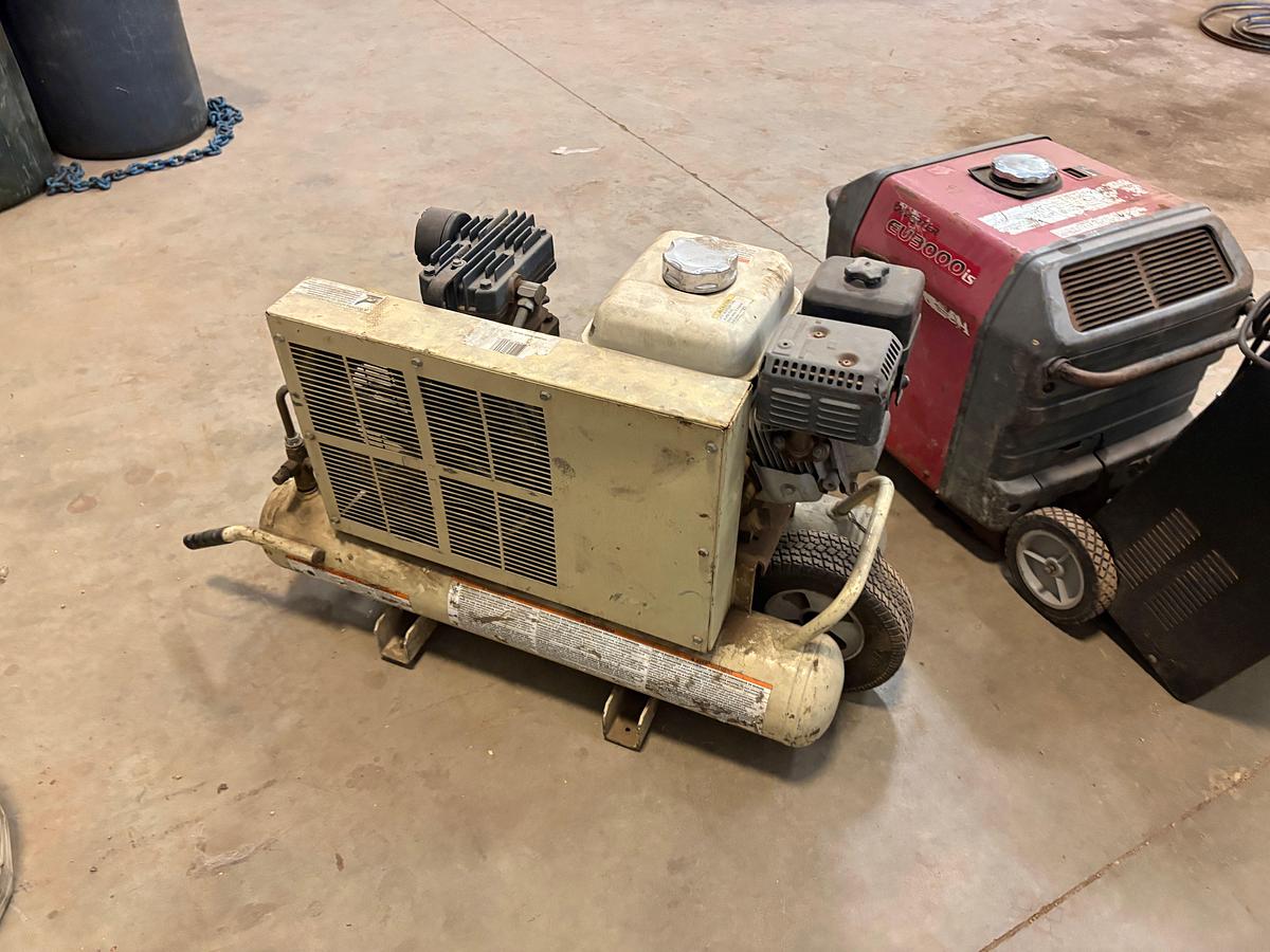 Used Honda eu3000is inverter generator, stark monster battery charger, & ingersoll Rand S9-8 air compressor