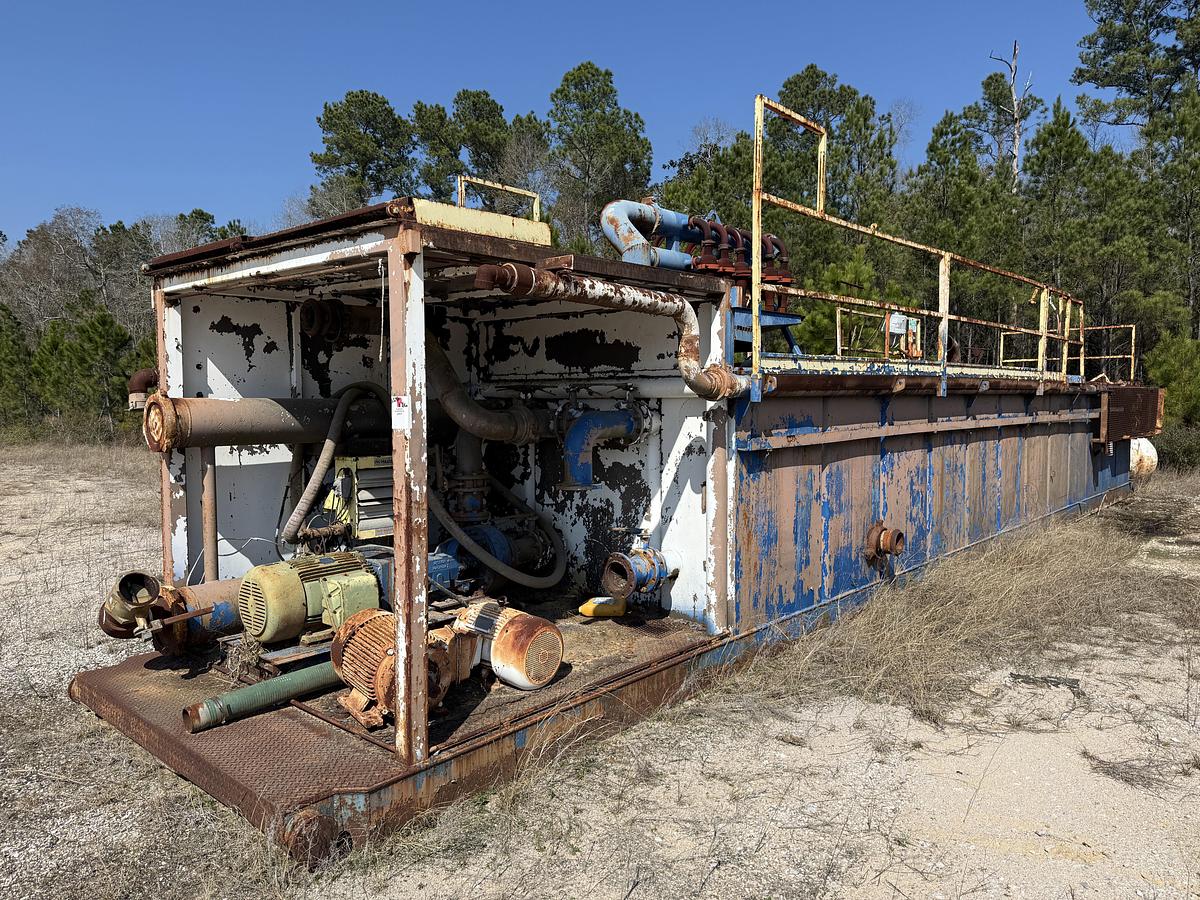 Used 40'L X 7.6'W X 5'H MUD TANK W/ 6X5 CENTRIFUGAL PUMP P/B 50-HP ELECTRIC MOTOR