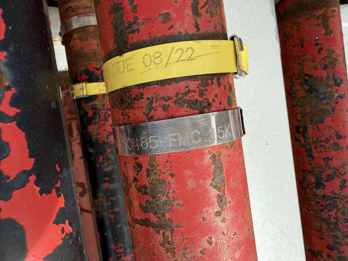 Used (22 X $) (17) 2” X 15’L & (5) 3” X 15’L FIG 1502 15K WP FLOW IRON W/ (2) 2-TIER STACKABLE PIPE RACKS