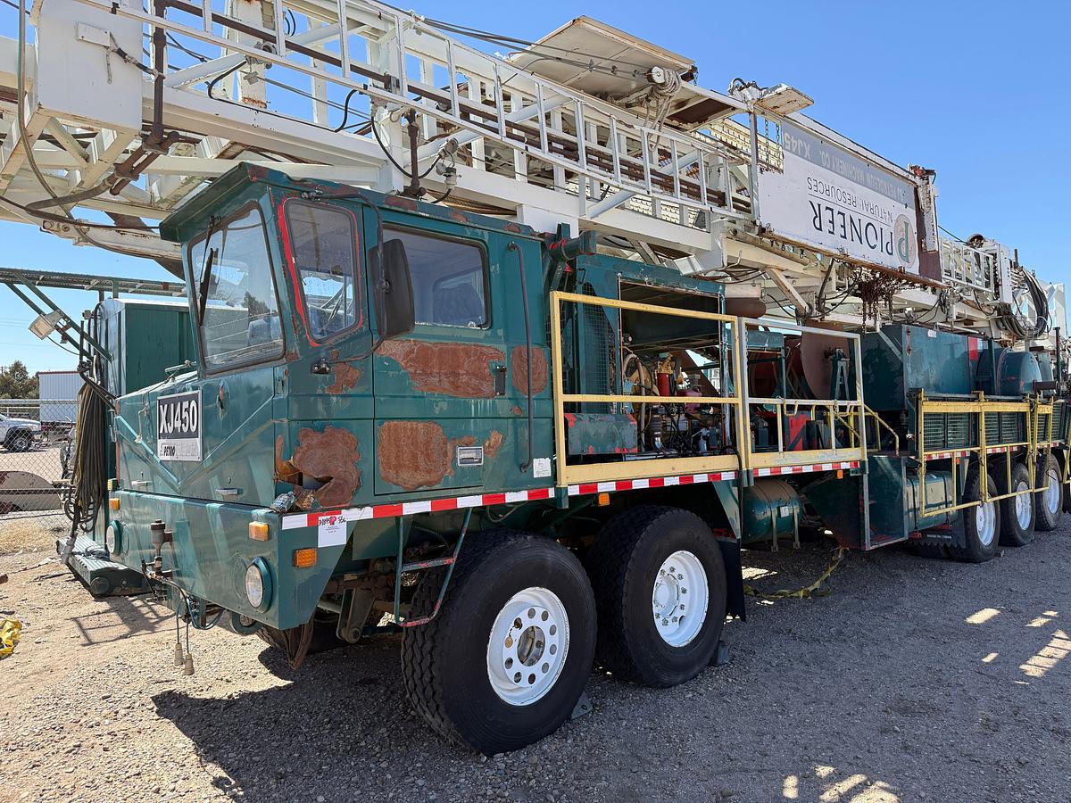 Used 2006 SJ PETRO XJ450 105’-303K LBS. 5-AXLE MOBILE DRILLING RIG