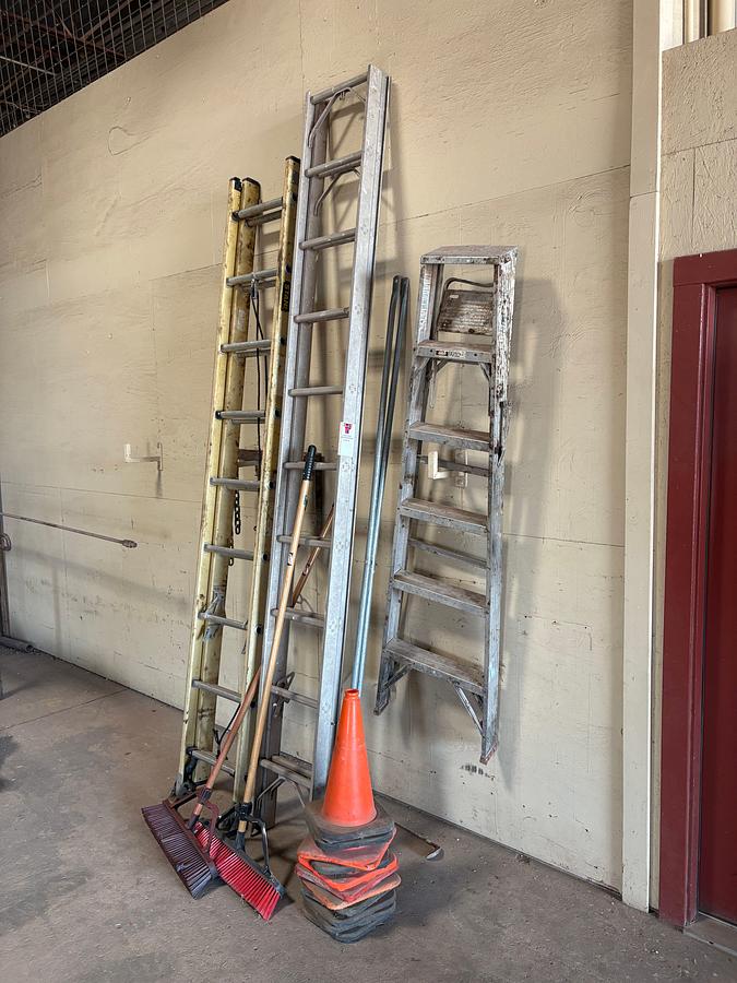 Used (2) extendable ladders, (1) A-frame ladder, push brooms, & traffic cones