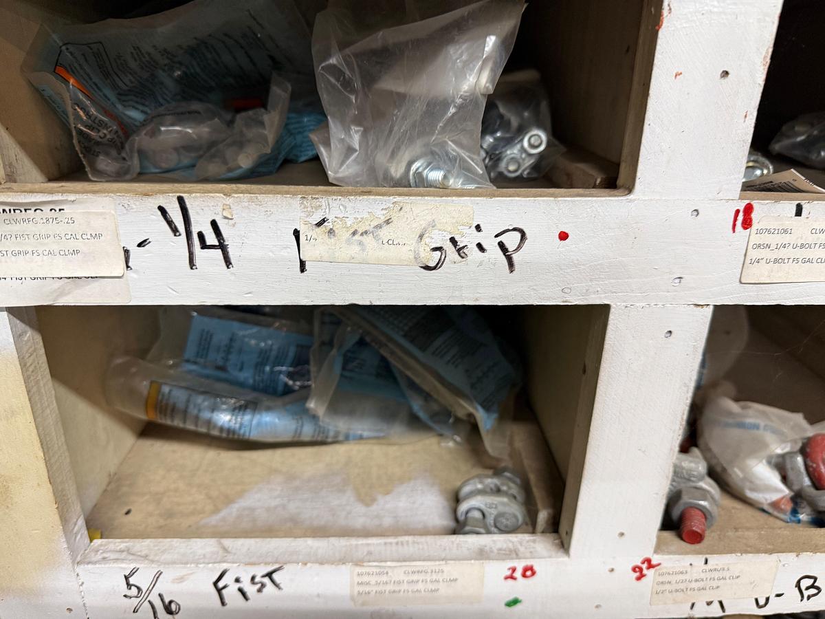 Used SECTION OF (50+)1/4” THRU 3/8” FIST GRIP U-BOLT CLAMPS, CHAIN HOOKS & BINDERS, SOME VICTAULIC COUPLINGS, ROD STRIPPER RUBBERS