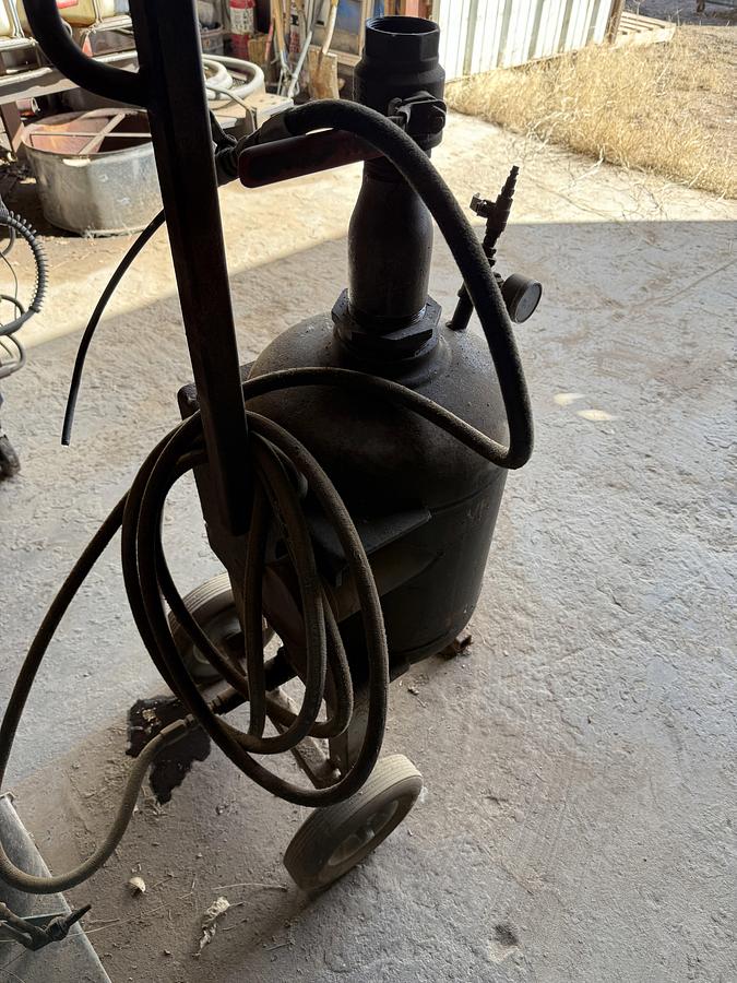 Used PNEUMATIC GREASE GUN & 120 LB CAP. BARREL W/ DOLLEY, (1) OXYGEN & ACETYLENE CART, (1) SHOP BUILT AIR TANK SPRAYER