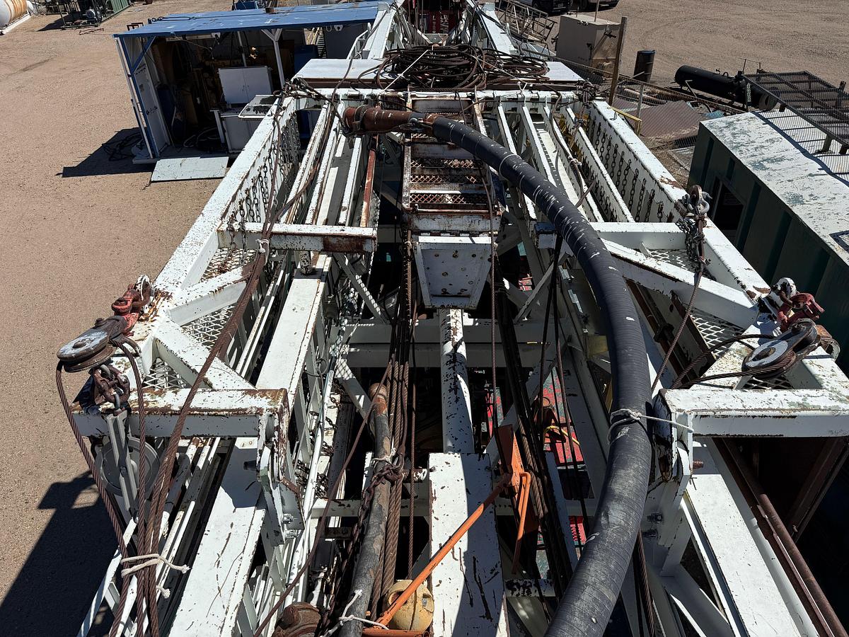Used 2006 SJ PETRO XJ450 105’-303K LBS. 5-AXLE MOBILE DRILLING RIG