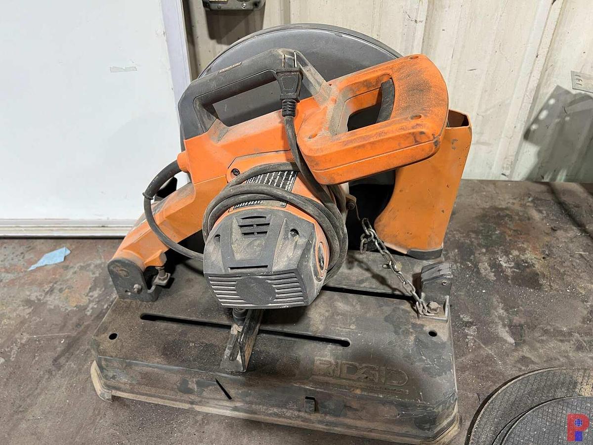 Used 10'L X 3'W METAL SHOP TABLE W/ RIGID CHOP SAW, METAL CUTTING DISCS, MTD CHAIN VICE, VICE, & WHITE BOARD