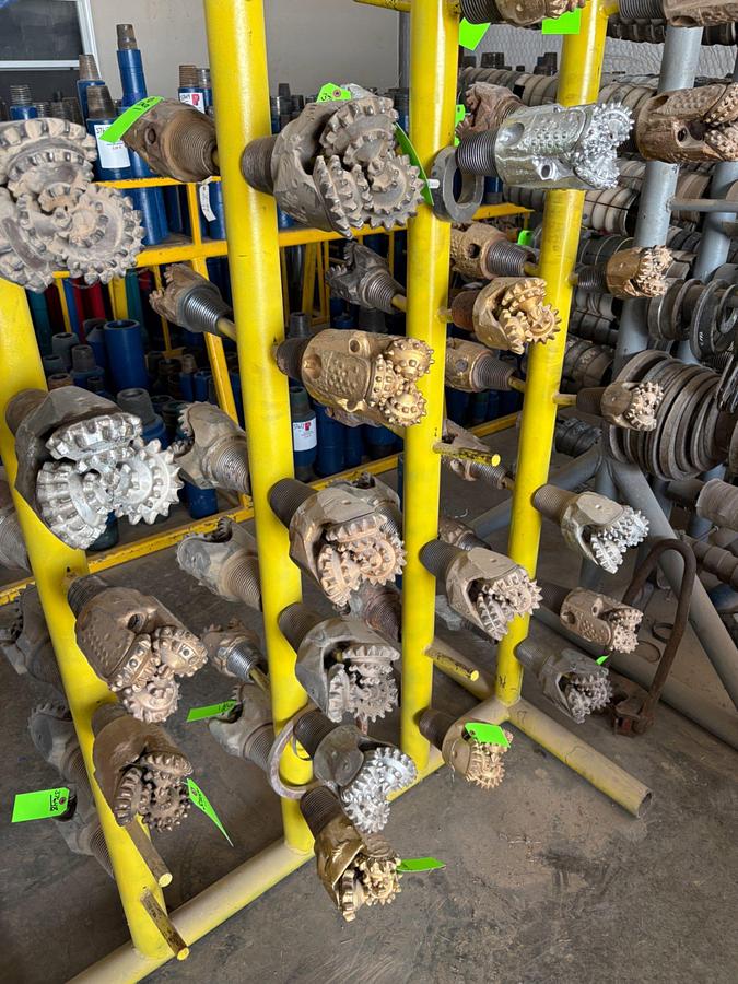 Used (6x$) tricone drill bits, 4-5/8” to 6-1/8”