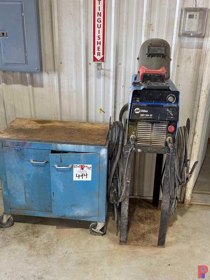 Used MILLER XMT304 CC DC INVERTER ARC WELDER W/ ROD BOX, RODS & WIRE