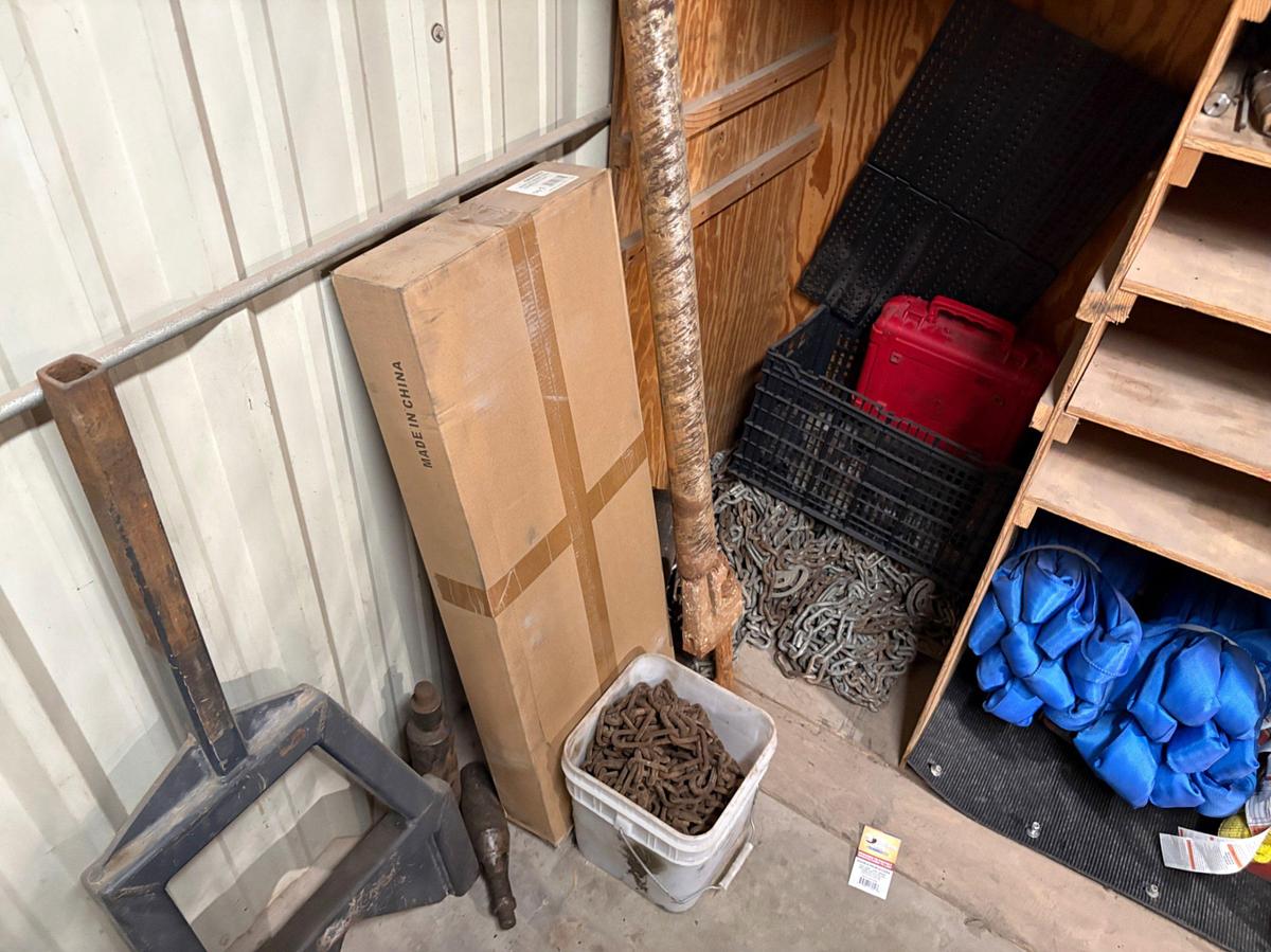 Used 2 shelves of assorted truck parts, tire chains, hand tools, etc