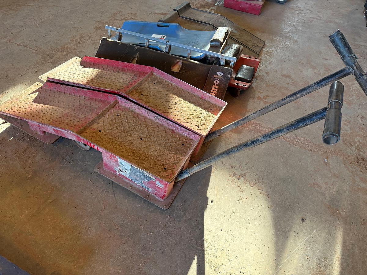 Used (2) WHEELED VEHICLE RAMPS, (2) SMALL RAMPS, (4) CREEPERS