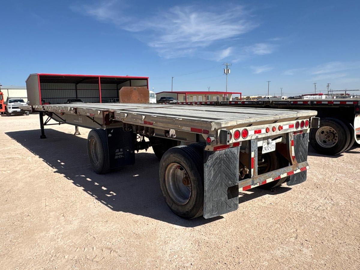 Used RAVENS 48’ X 8’ T/A FLATBED TRAILER