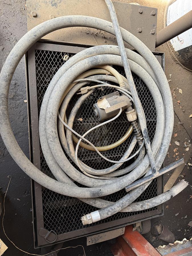 Used 44”L X 36”W X 40”H OIL TOTE W/ PNEUMATIC GUN HOSE REEL, & (2) OIL CATCH PANS