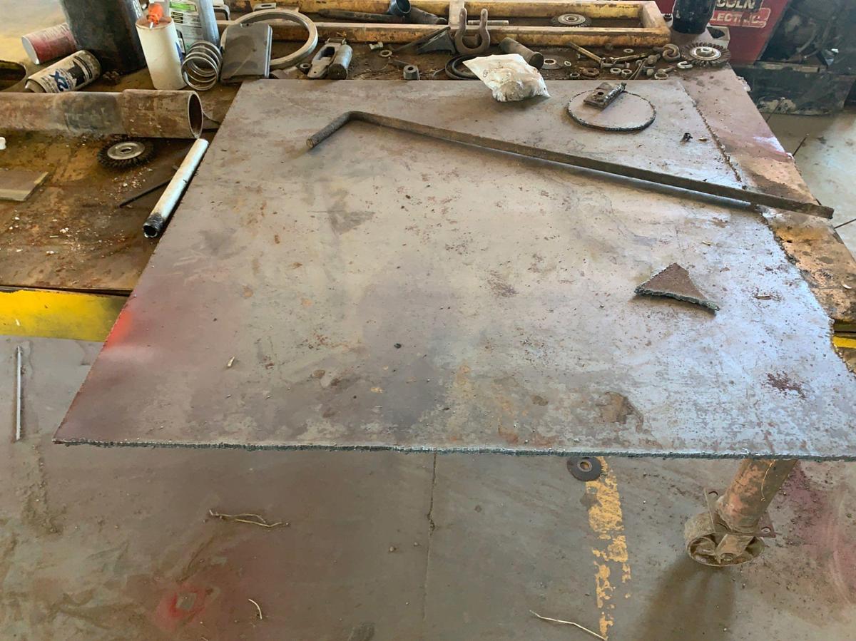 Used 8’ x 4’ x 2’ 6” Rolling Shop Table and all its Contents