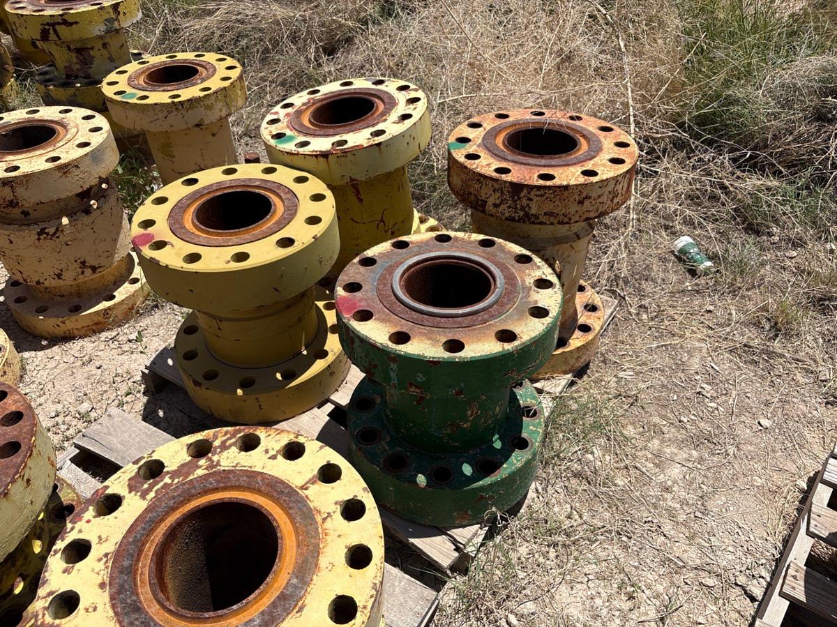 Used (7) assorted 7-1/16” spacer spools