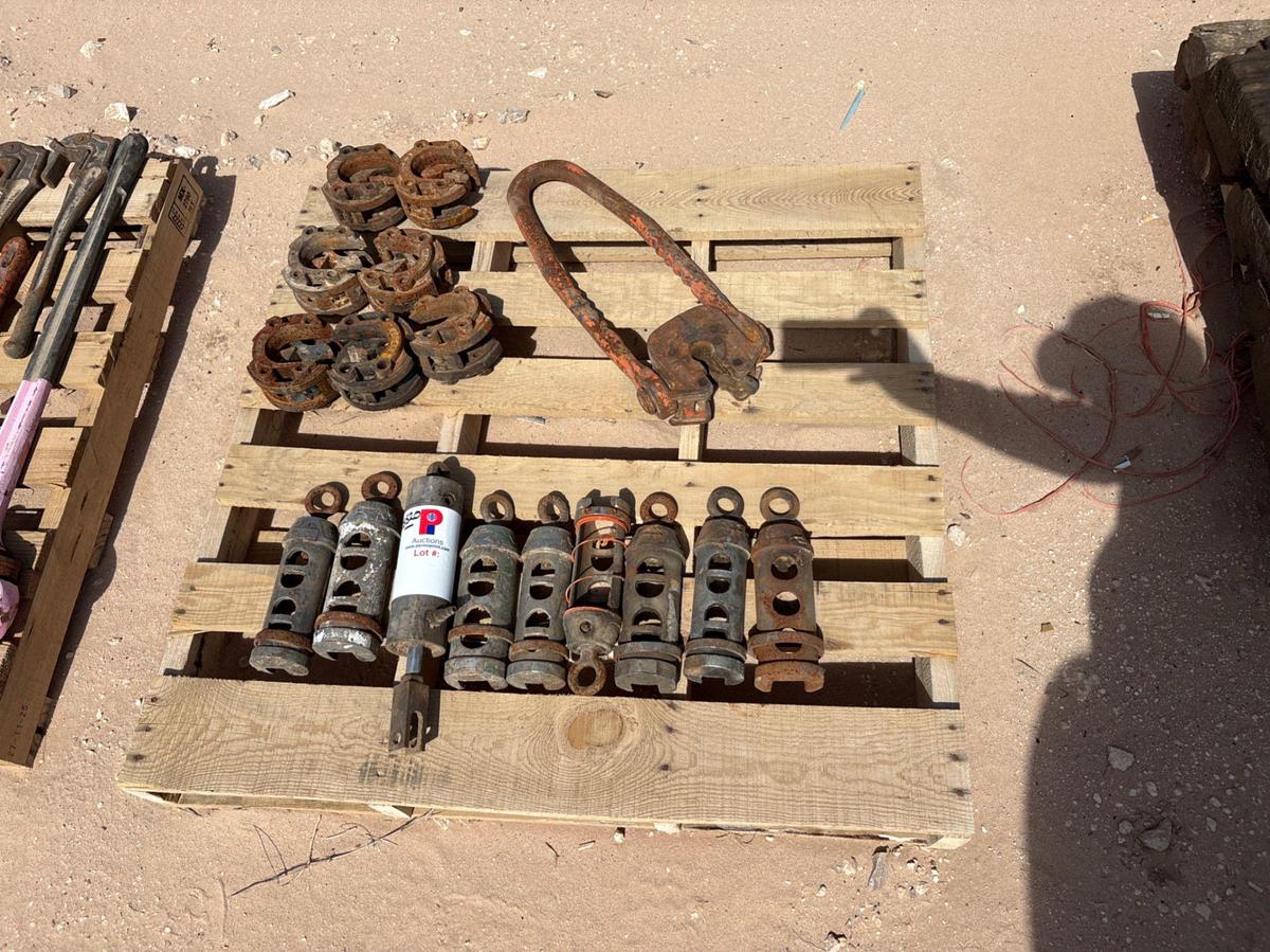 Used Pallet w/ (7) rod tong heads, (8) rod transfers, & (1) plate type rod elevator