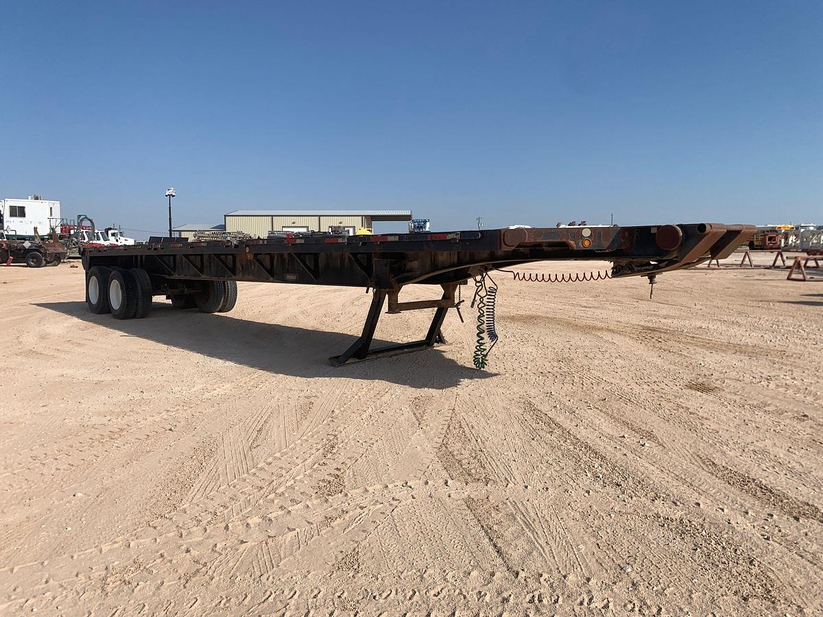 Used Dynaweld 46’ x 102” t/a flatbed trailer