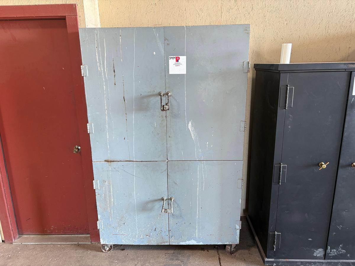 Used 4’ x 2’ x 6’ 4-door rolling supply cabinet