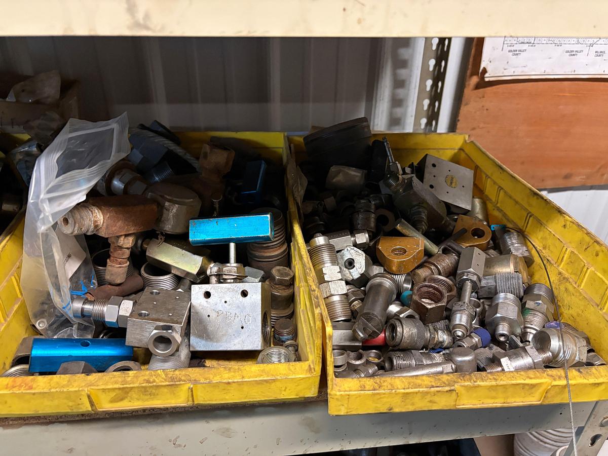 Used 4’ x 2’ x 6’ shelving w/ assorted test pump gauges, needle valves, hydraulic fittings, packing/seals, toolboxes, etc.