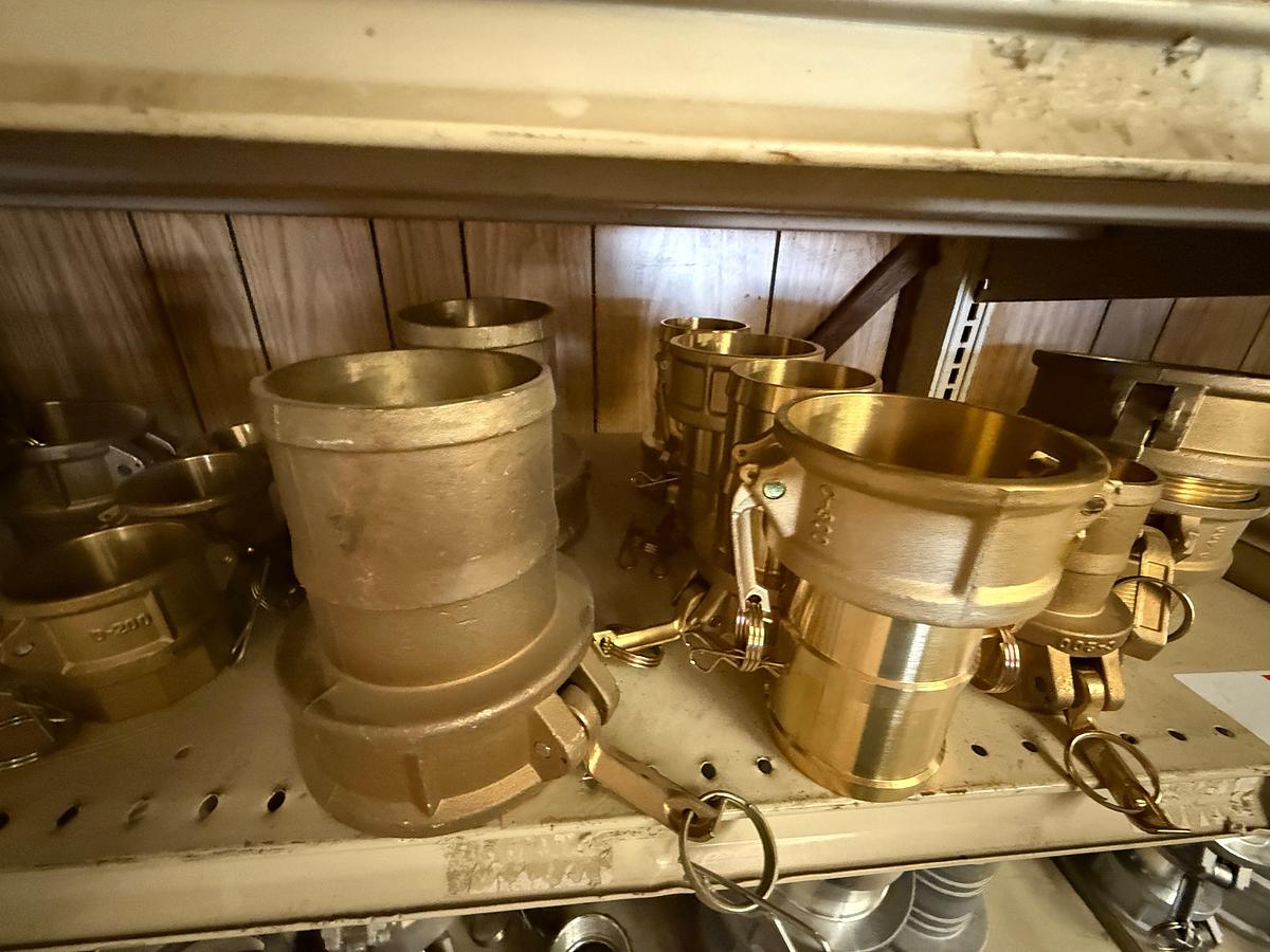 Used 2ND SHELF W/ (25+) 2” THRU 4” CAMLOCK BRASS FITTINGS