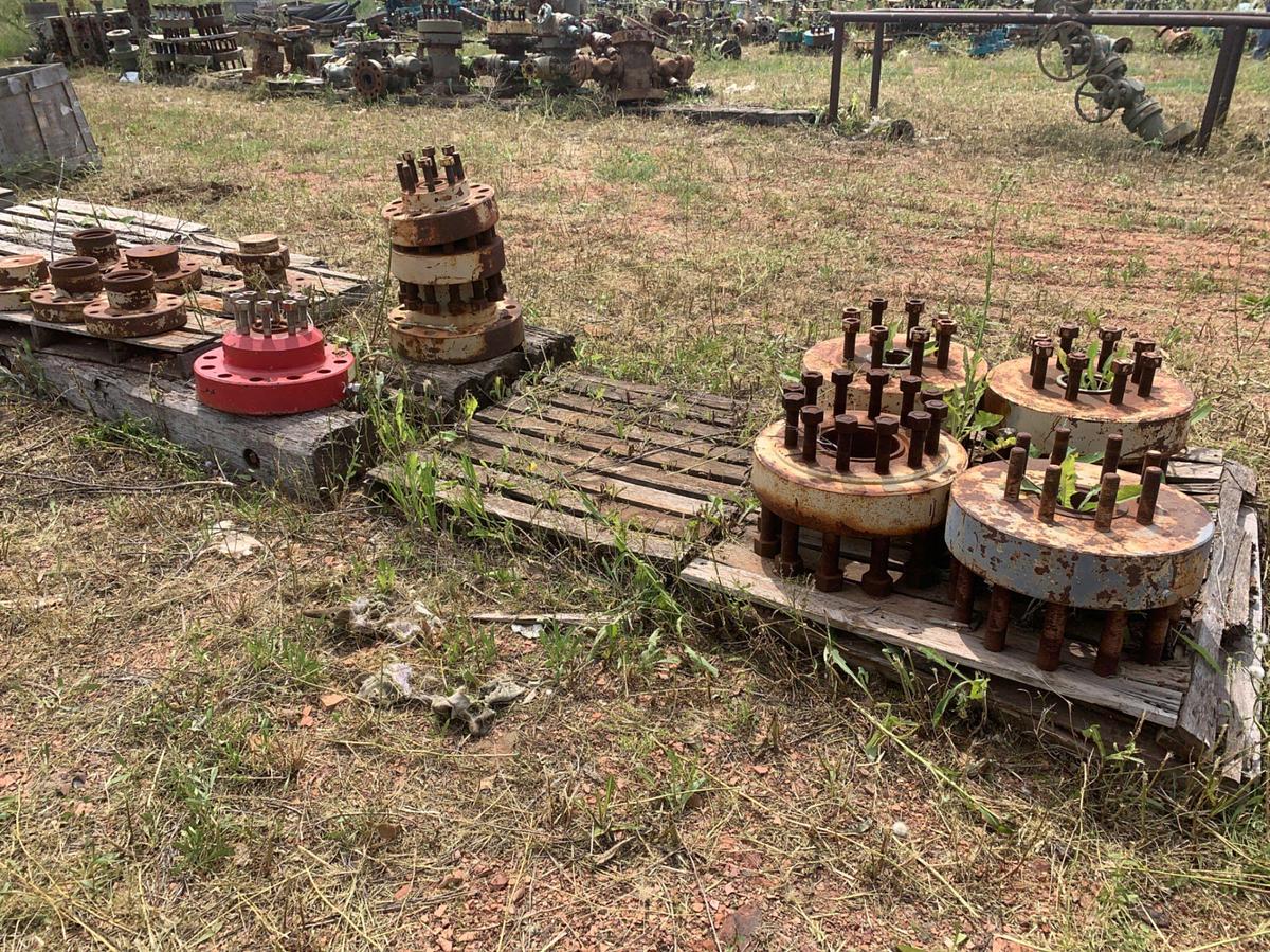 Used Row of 2in Flange Adapters, Caps, DSA’s, 4-1/16 Plug Valves, 7-1/16 Casing Heads and 2in Fluid Crosses