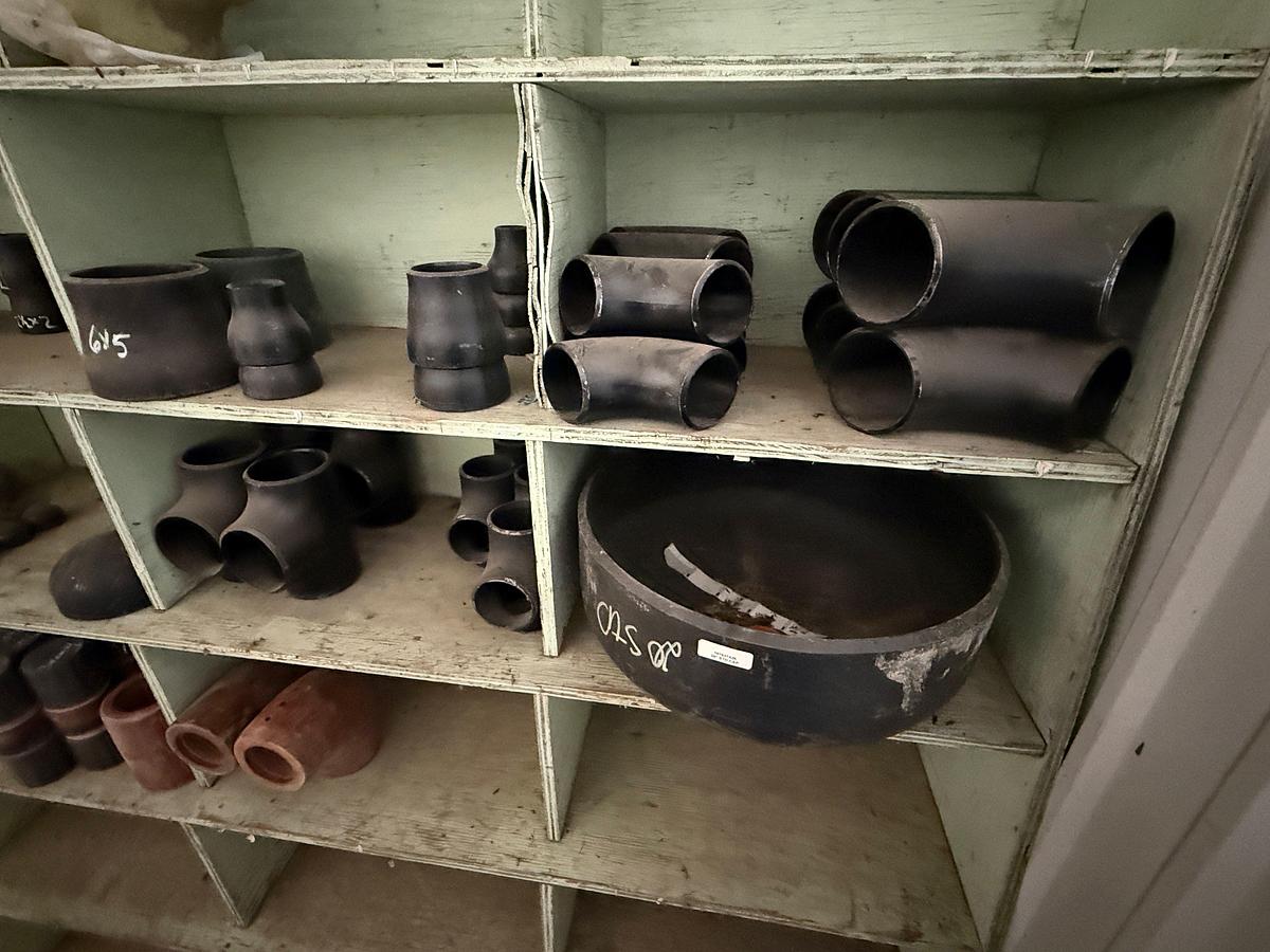 Used SECTION OF (40+) 1” THRU 6” BUTT WELD STEEL FITTINGS, (1) 20” BUTT WELD CAP, & SOME FIBERGLASS FITTINGS