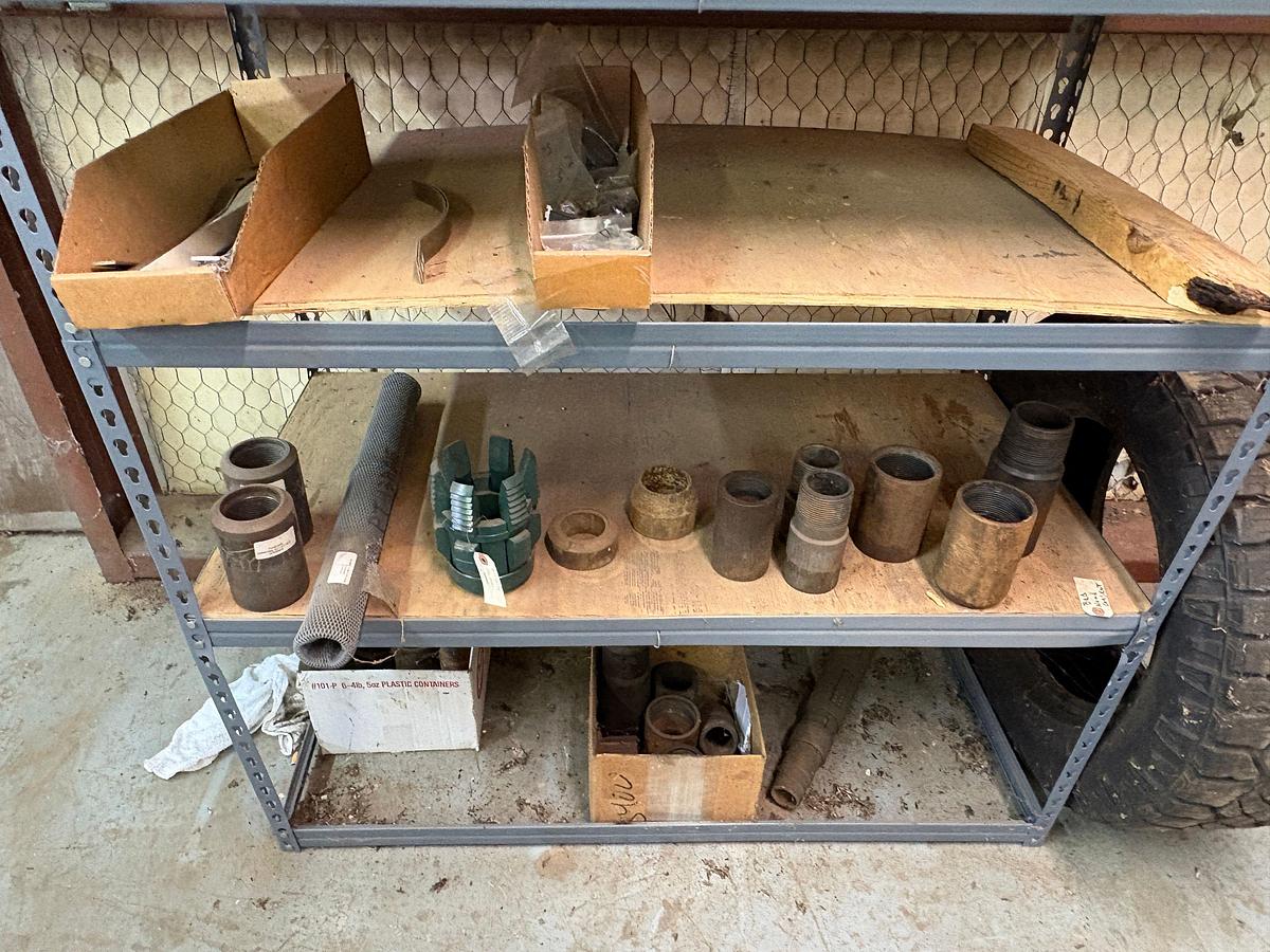 Used 4’ x 2’ x 70” shelving w/ packer & tubing anchor parts