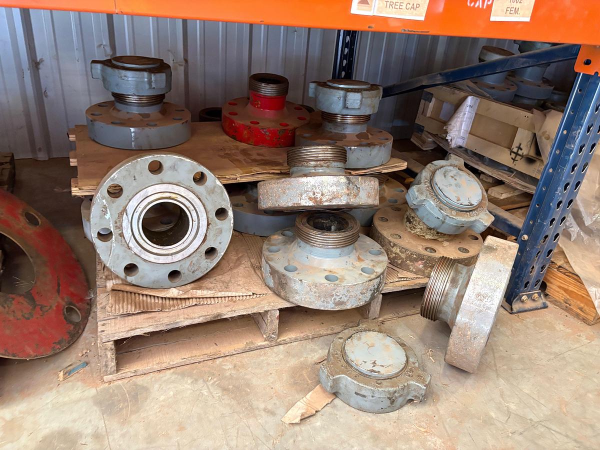 Used Contents of (4 shelves) w/ (65) assorted 2” to 4” weco flanges, casing hangers, & (38) 7” casing pup jts