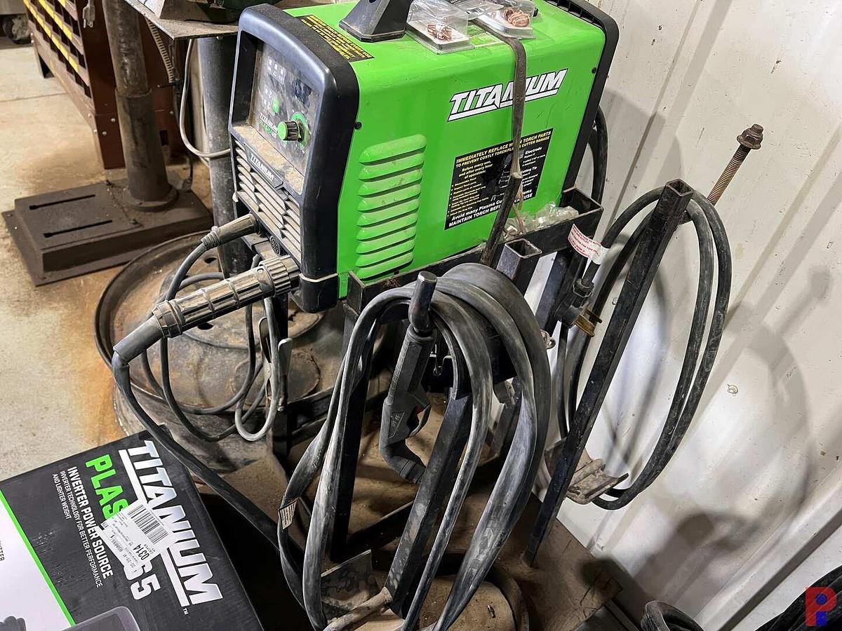 Used TITANIUM 65 AMP PLASMA CUTTER W/ ACCESORIES & ROLLING STAND