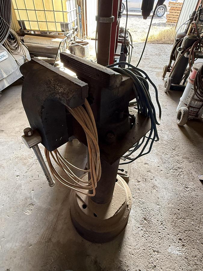 Used (1) WILTON VICE MTD ON STAND, (1) ELECT. 13” DRILL & (1) 20 TON BOTTLE JACK PRESS, (1) PROPANE BOTTLE & TORCH, BATTERY CHARGER