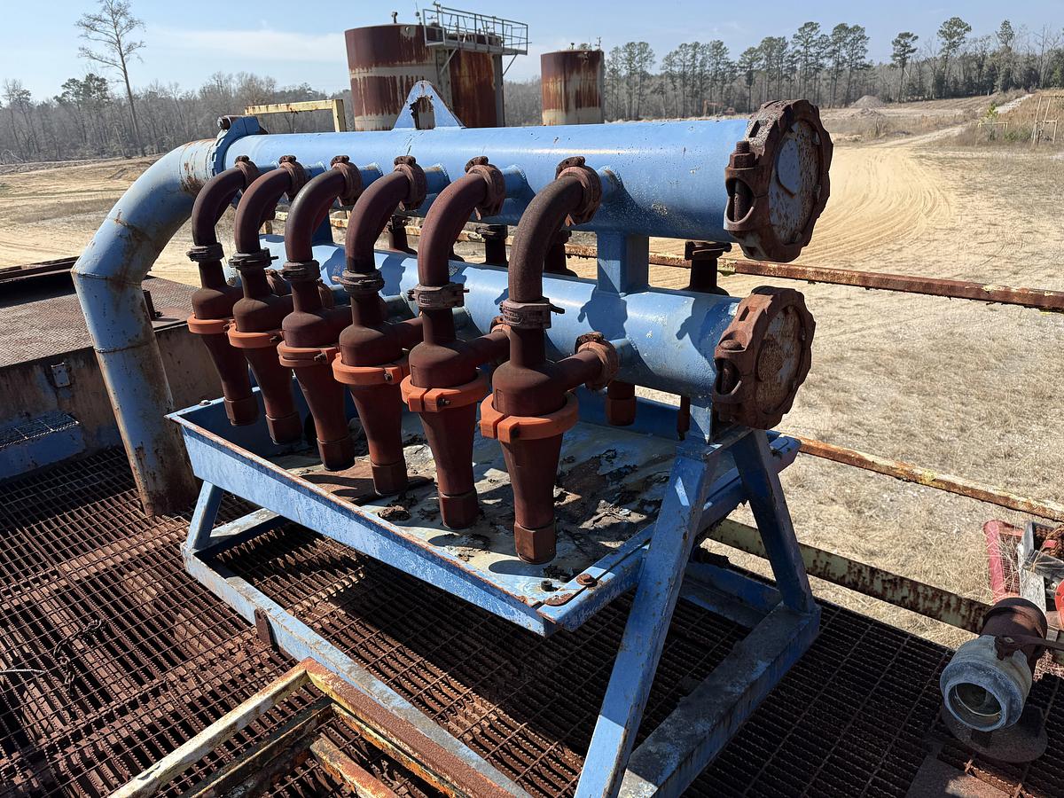 Used 40'L X 7.6'W X 5'H MUD TANK W/ 6X5 CENTRIFUGAL PUMP P/B 50-HP ELECTRIC MOTOR