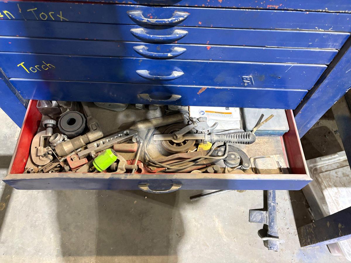 Used 34” x 18” x 60” tool box w/ contents