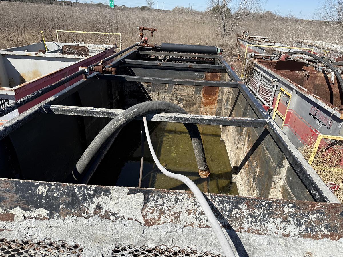 Used 30’ X 8’ X 5’ 4-COMP CEMENT MIXING TANK W/ (2) AGITATORS, CATWALK, & IRON RACK