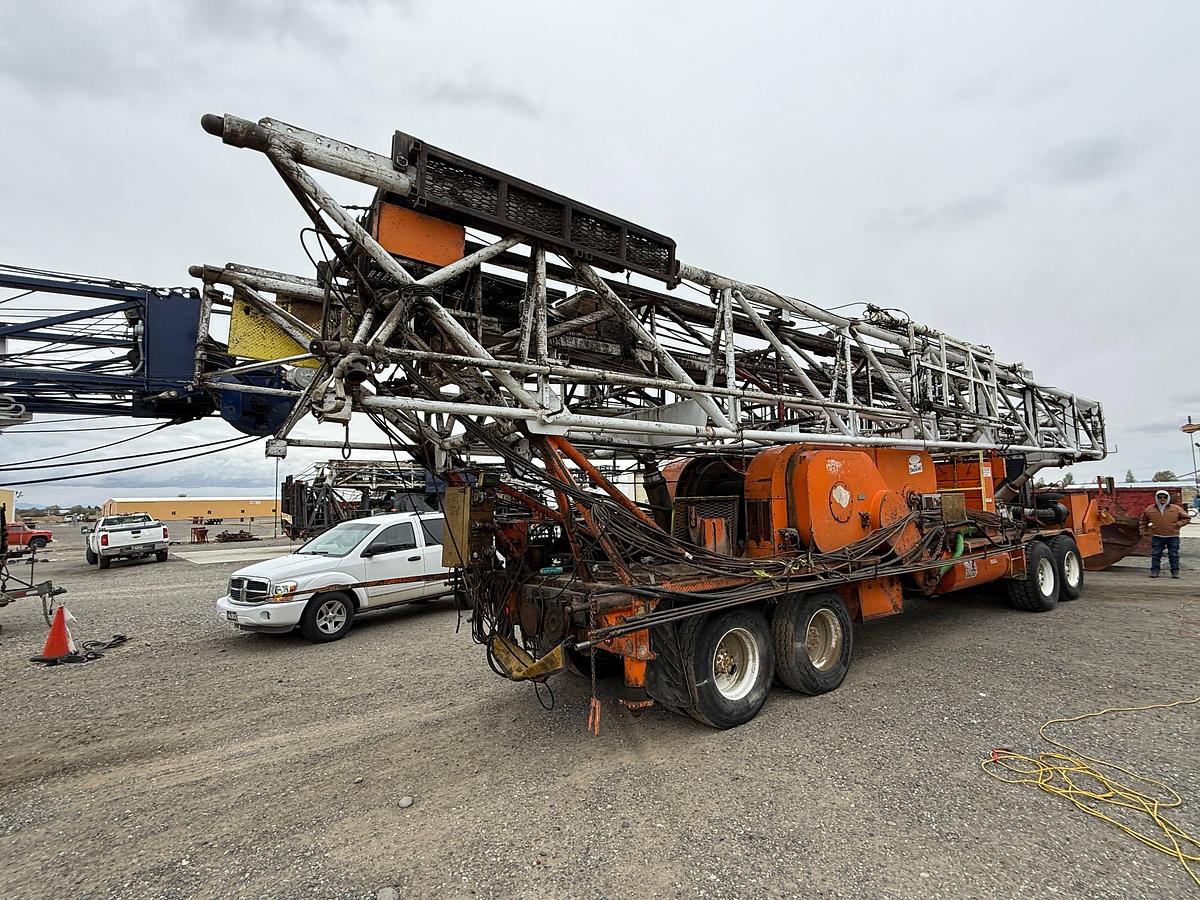 Used 1980 FRANKS MOBILRIG 300 1287/160 DTD-HT 96’-215K 4-AXLE WELL SERVICE WORKOVER RIG