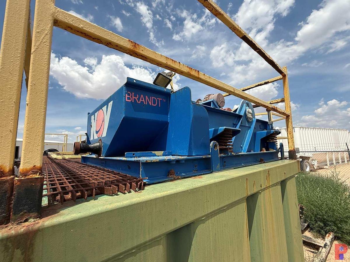 Used 30’L X 8’ W X 5.8’ 3-COMPARTMENT 180 BBL. MIXING TANK P/B (2) 75 HP ELECTRIC MOTORS