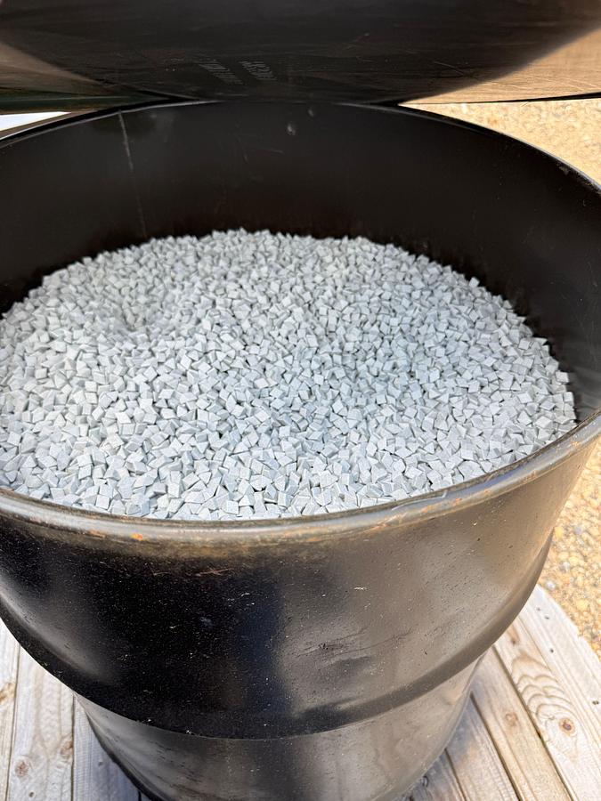 Used (3) 55 gallon drums of Triangular Ceramic Abrasive Polishing Tumbling Media. Approximately 700 lbs. in each drum.