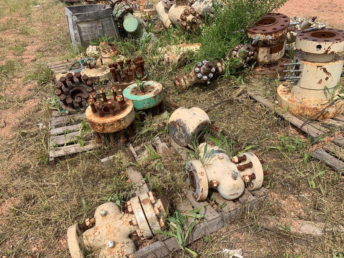 Used Row of 2in Flange Adapters, Caps, DSA’s, 4-1/16 Plug Valves, 7-1/16 Casing Heads and 2in Fluid Crosses