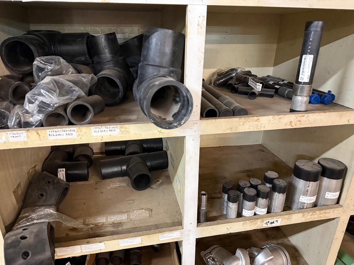 Used SECTION OF MOSTLY HEAVY WALL PVC & STEEL FITTINGS, VICTAULIC COUPLERS, SWAGES, COLLARS, NIPPLES, (3) 2” JAYCO VENT VALVES