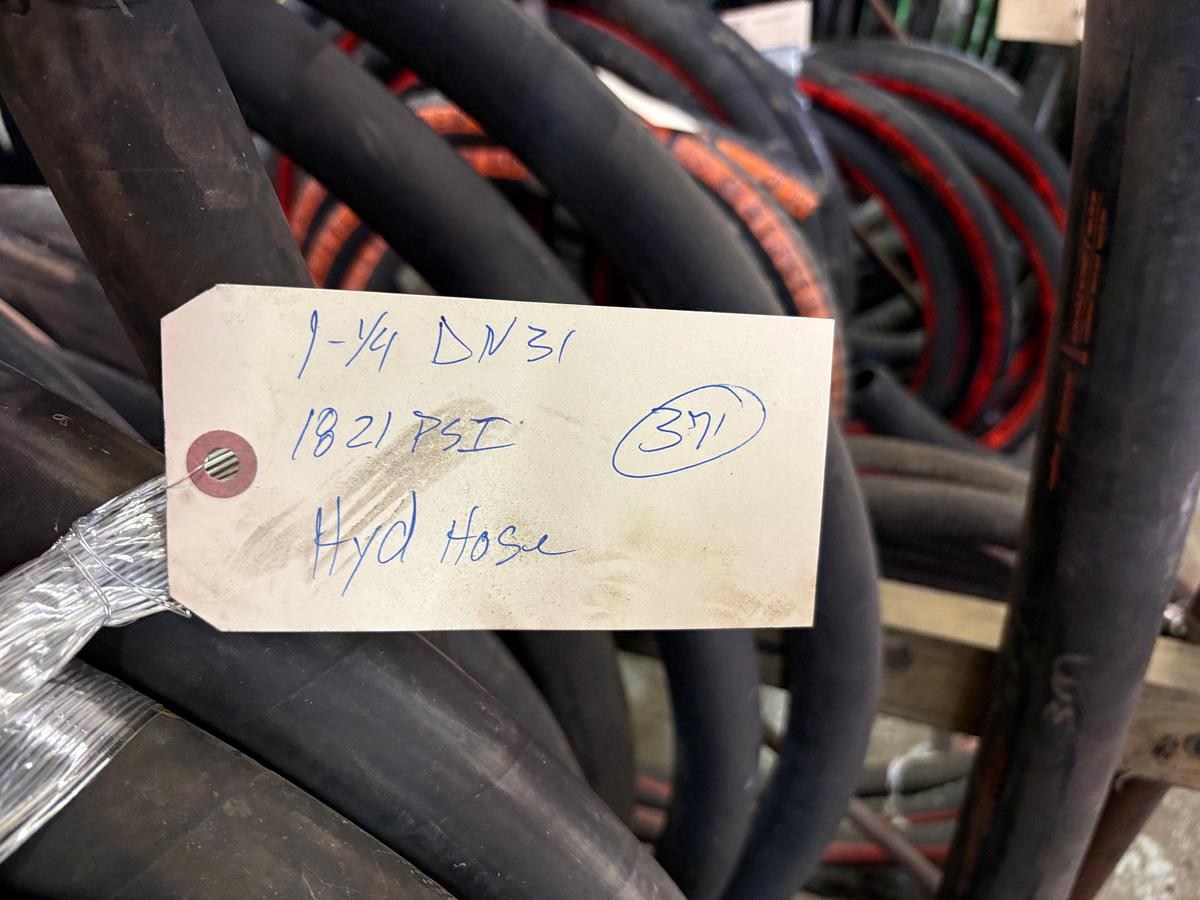 Used 8’ x 4’ x 4’ rack w/ assorted vacuum, hydraulic, & rubber hoses