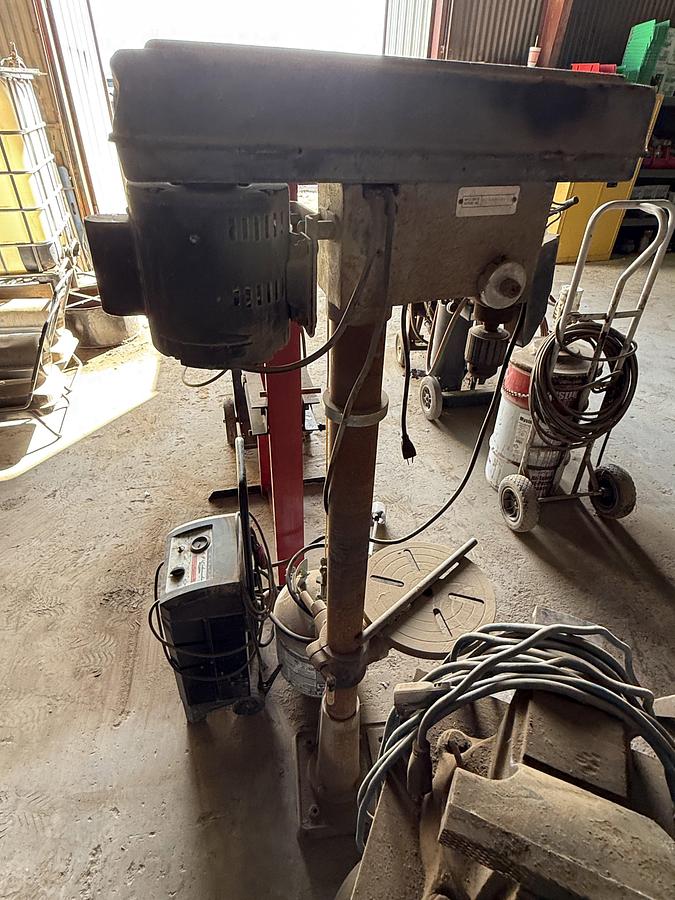 Used (1) WILTON VICE MTD ON STAND, (1) ELECT. 13” DRILL & (1) 20 TON BOTTLE JACK PRESS, (1) PROPANE BOTTLE & TORCH, BATTERY CHARGER