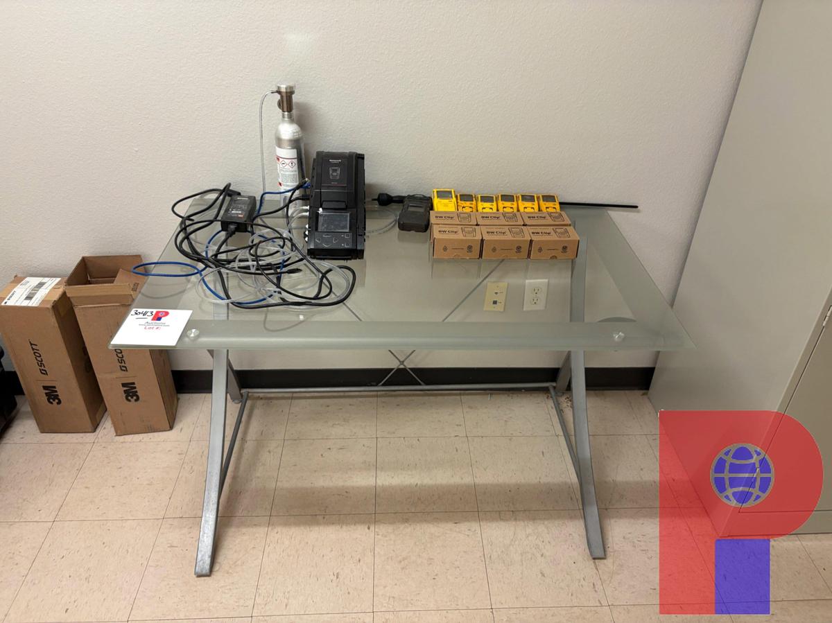 Used GLASS-TOP TABLE W/ (12) HONEYWELL PORTABLE SINGLE-GAS DETECTION DEVICES & CALIBRATION MACHINE