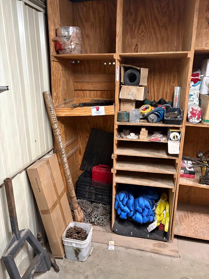 Used 2 shelves of assorted truck parts, tire chains, hand tools, etc